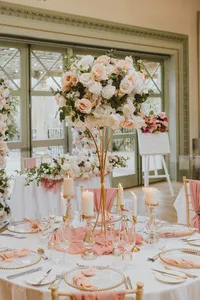 pink wedding styling with rose centrepiece and pink table decor