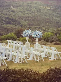 The Alice wedding white and blue floral collection outdoor wedding ceremony florals