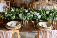 white wedding flowers styled on wedding table