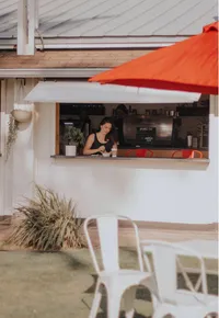 Rustic cafe decor and seating at The Country on Oahu's North Shore