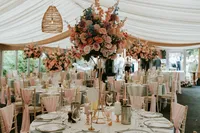 Woodman Inn reception room pink wedding styling with floral table centrepiece