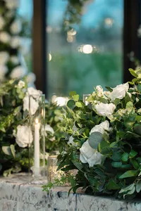 Wedding table styling with white flowers and candles