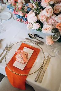 close of a wedding table setting and wedding favour