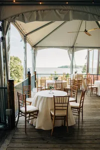 The tented indoor-outdoor deck with panoramic views at Chesapeake Bay Foundation Weddings and Events