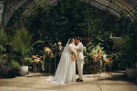 Detroit wedding photographer Grace Wan captures a bride and groom kissing during their elopement ceremony.