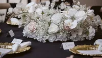 close up of white floral table centrepieces