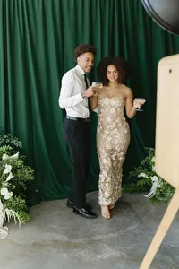 green-curtain-floral-couple-toast