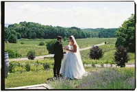 35mm film wedding photography Grace Wan captures a bride and groom privately reading their vows to one another.