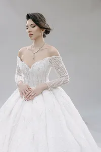 Bride Victoria in an off-the-shoulder beaded ballgown, studio bridal portrait by Dove & Fox