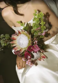 unique, vintage inspired bridal bouquet in shades of green, pink, fushia, blush, and grey. made by a seattle wedding florist who services tacoma, seattle, puyallup and the greater pnw