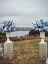The Alice wedding white and blue outdoor floral display