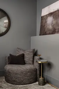 Seating nook in a moody space, designed by Asheville interior designer, Jennifer Smith Design.