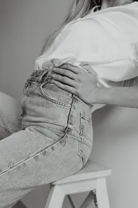 kaboompics_Light blue jeans - white silk shirt
