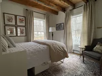 Murphy bed and windows in the Brookside Retreat office