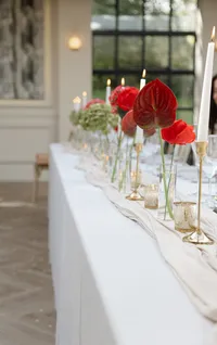 red and burgundy wedding floral table decor