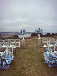 The Alice wedding white and blue floral collection outdoor wedding ceremony florals