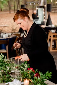 Wedding planner with Weddings & Events by Raina carefully checks every detail