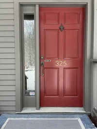Red front door at Brookside Retreat
