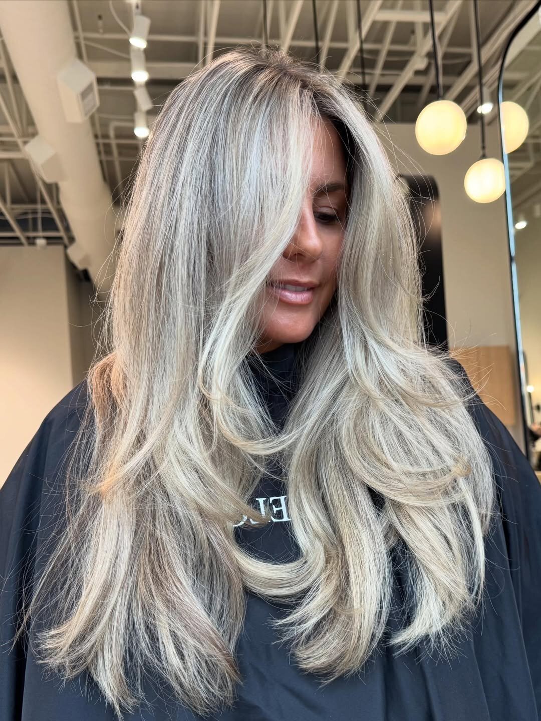 Long hair after a hand-tied extension install at Echelon Salon in Eagle, Idaho