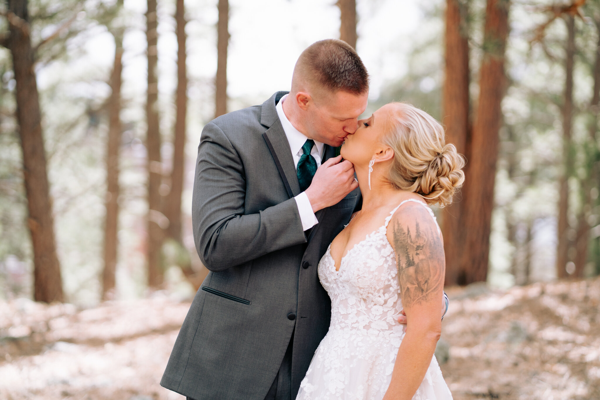 Couple during golden hour elopement portraits in the Ponderosa pine forest near Flagstaff Arizona