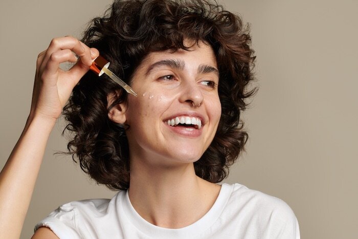 Lip balm application — natural skincare by Sadie Lauder.