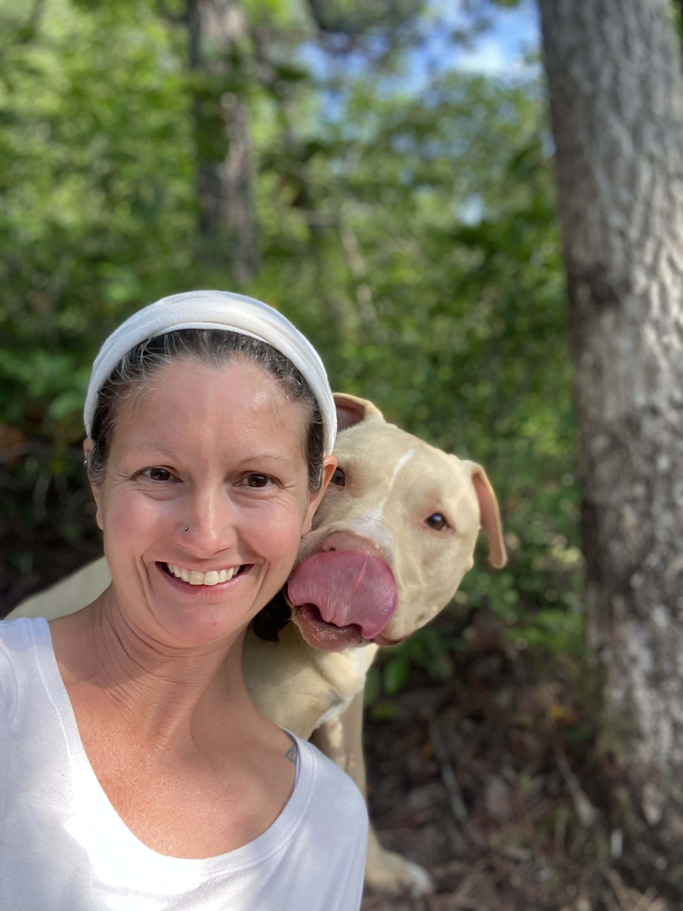 Rachel Cline outdoors with her dog, Loki