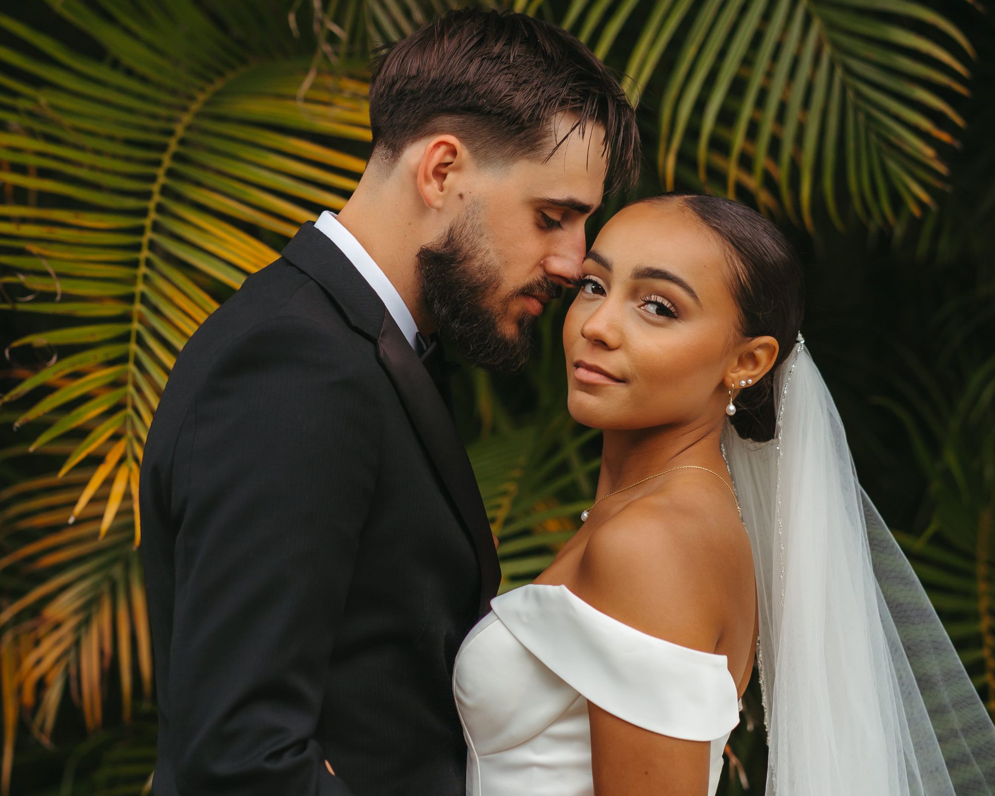Couple with palm trees