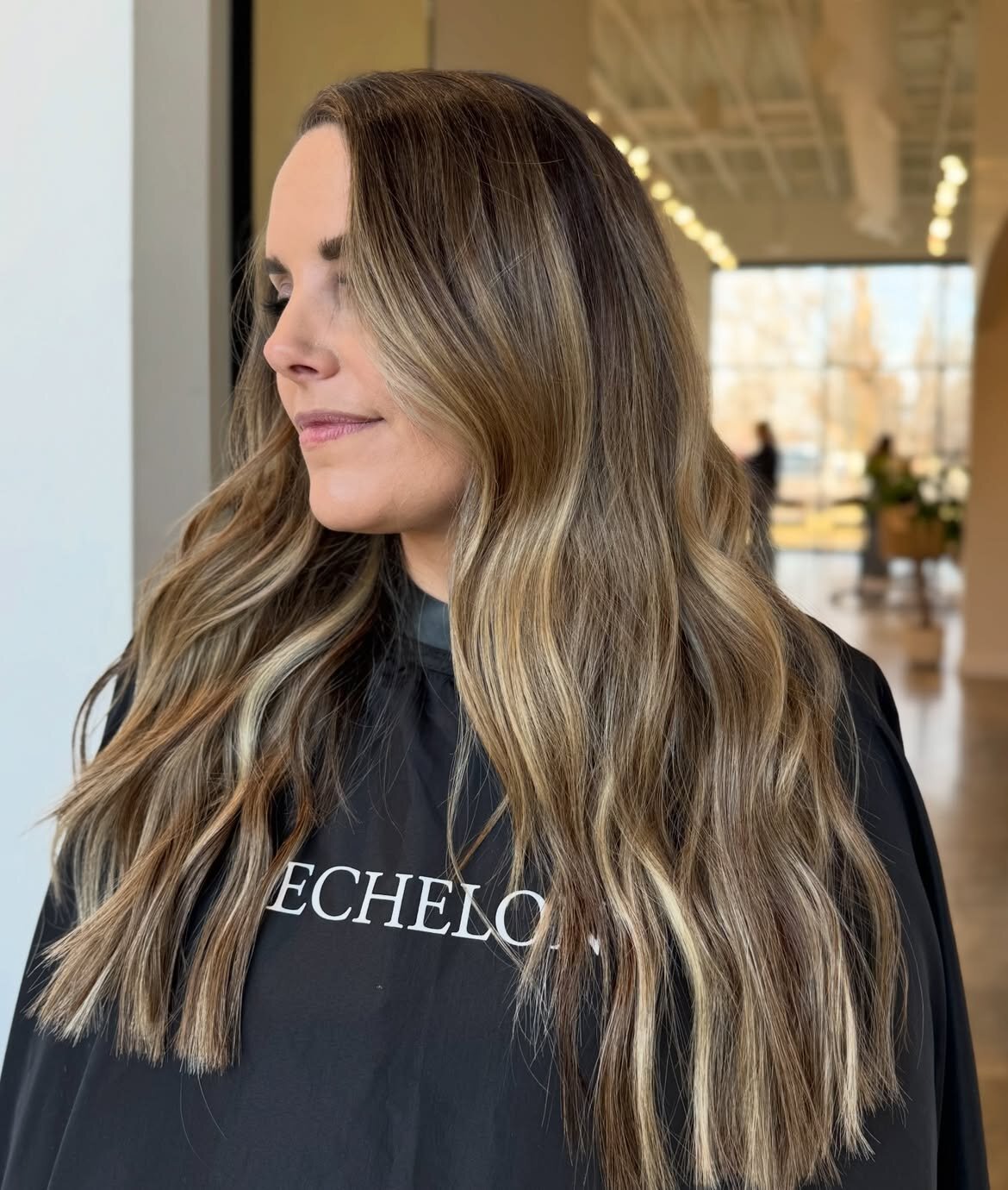 Blonde hair color, bronde color and hand-tied extensions by Echelon Salon in Eagle, Idaho