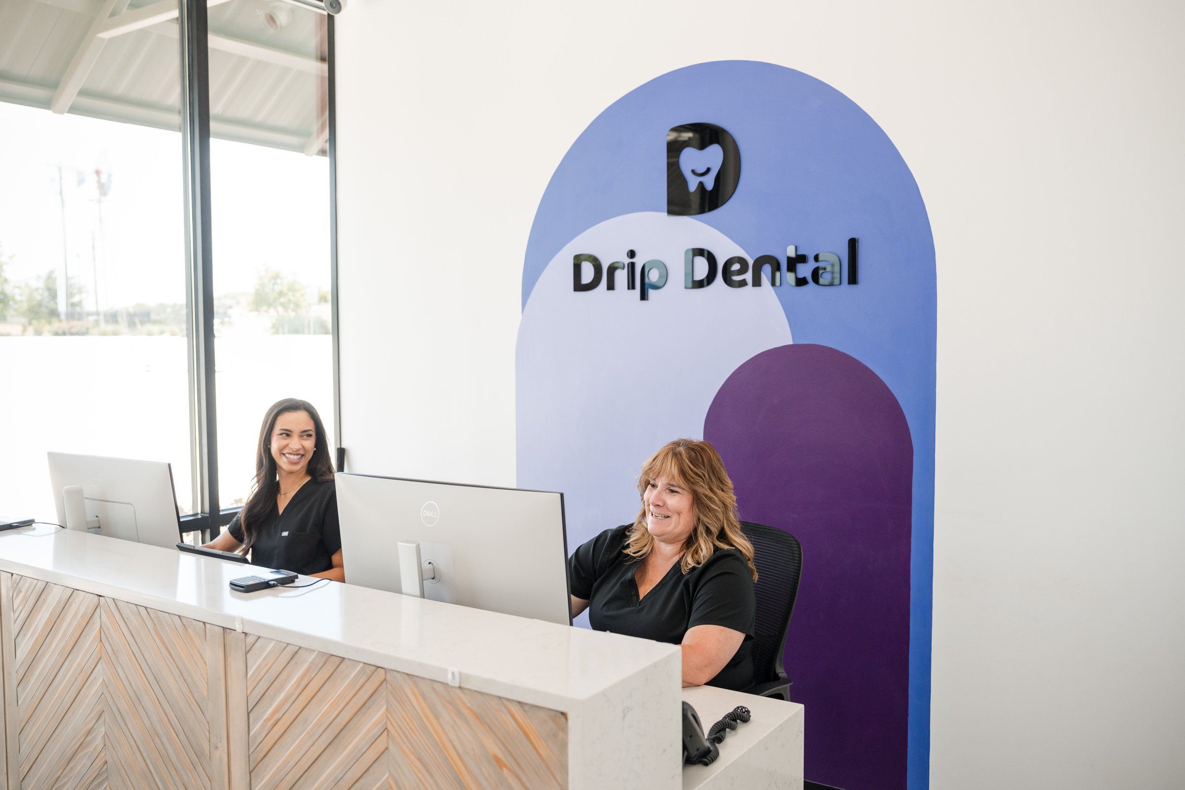 Drip Dental front desk team members, Dripping Springs dental office