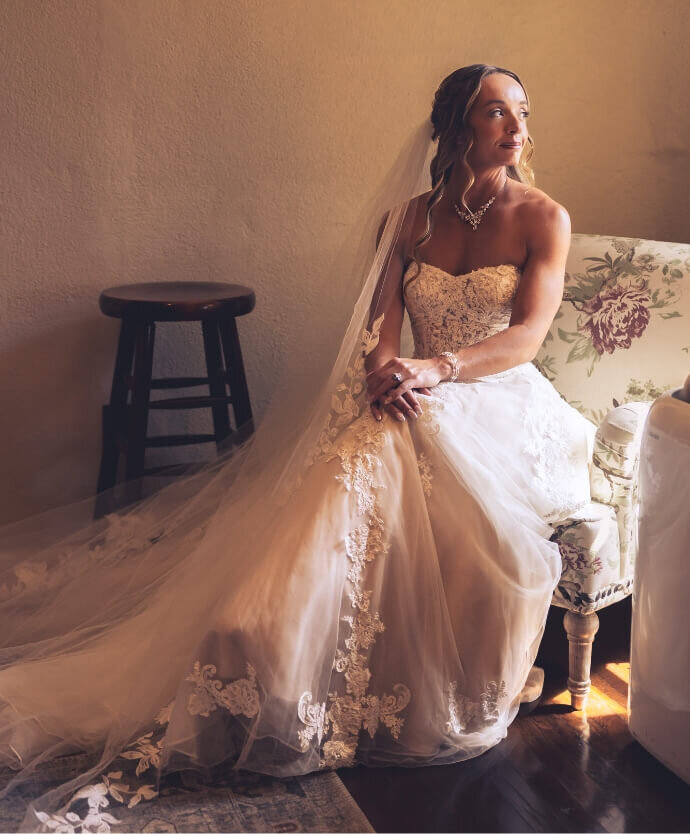 Bride seated in her lace gown during Southern California wedding photography