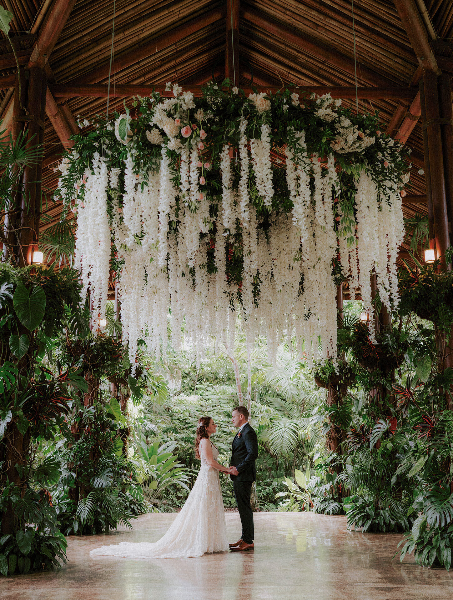 Bride and groom portrait at an open-air pavilion wedding venue in Costa Rica