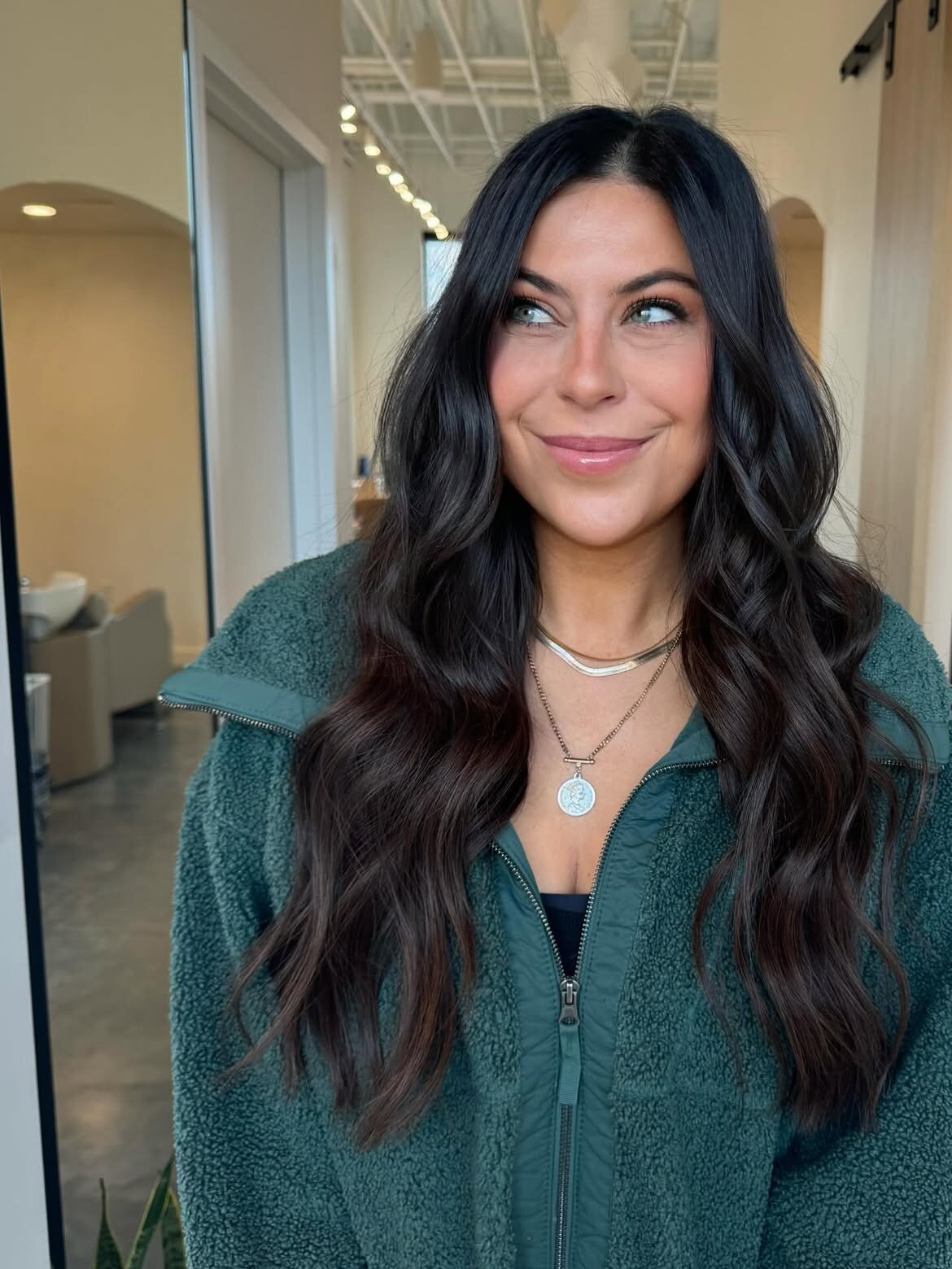 Custom brunette hair color and hand-tied extensions at Echelon Salon in Eagle, Idaho