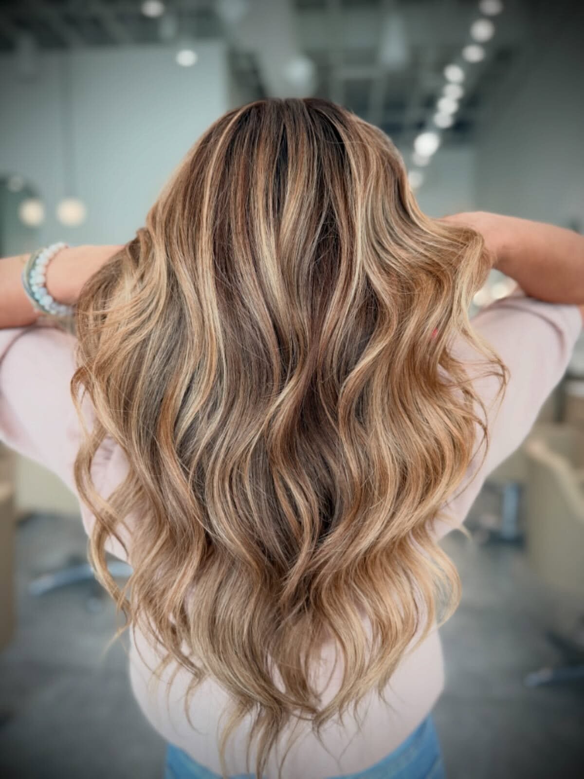 Custom bronde color and hand-tied extensions at Echelon Salon in Eagle, Idaho
