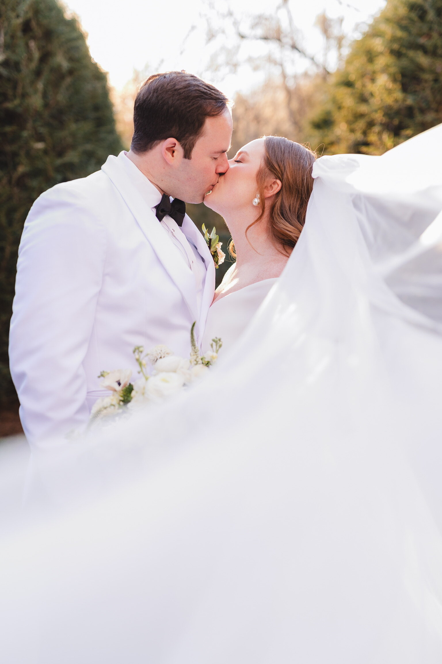 married couple kissing