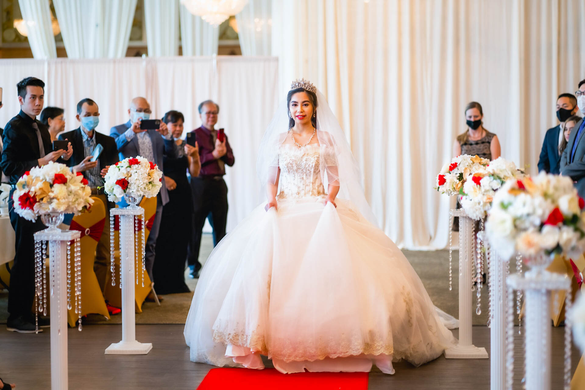 Bride entering her Chinese wedding reception