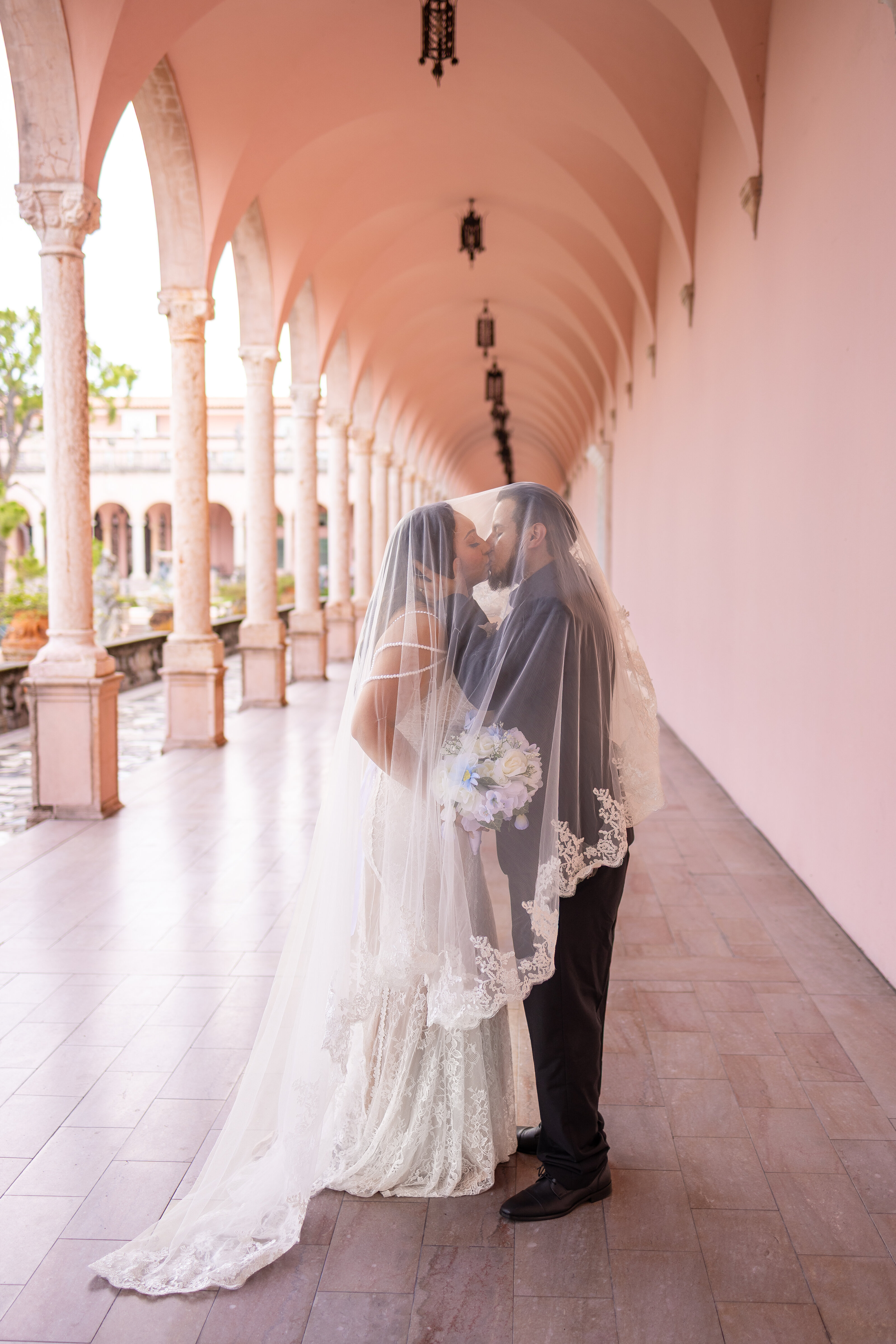 Couple kissing during their elopement at The Ringling Museum in Sarasota