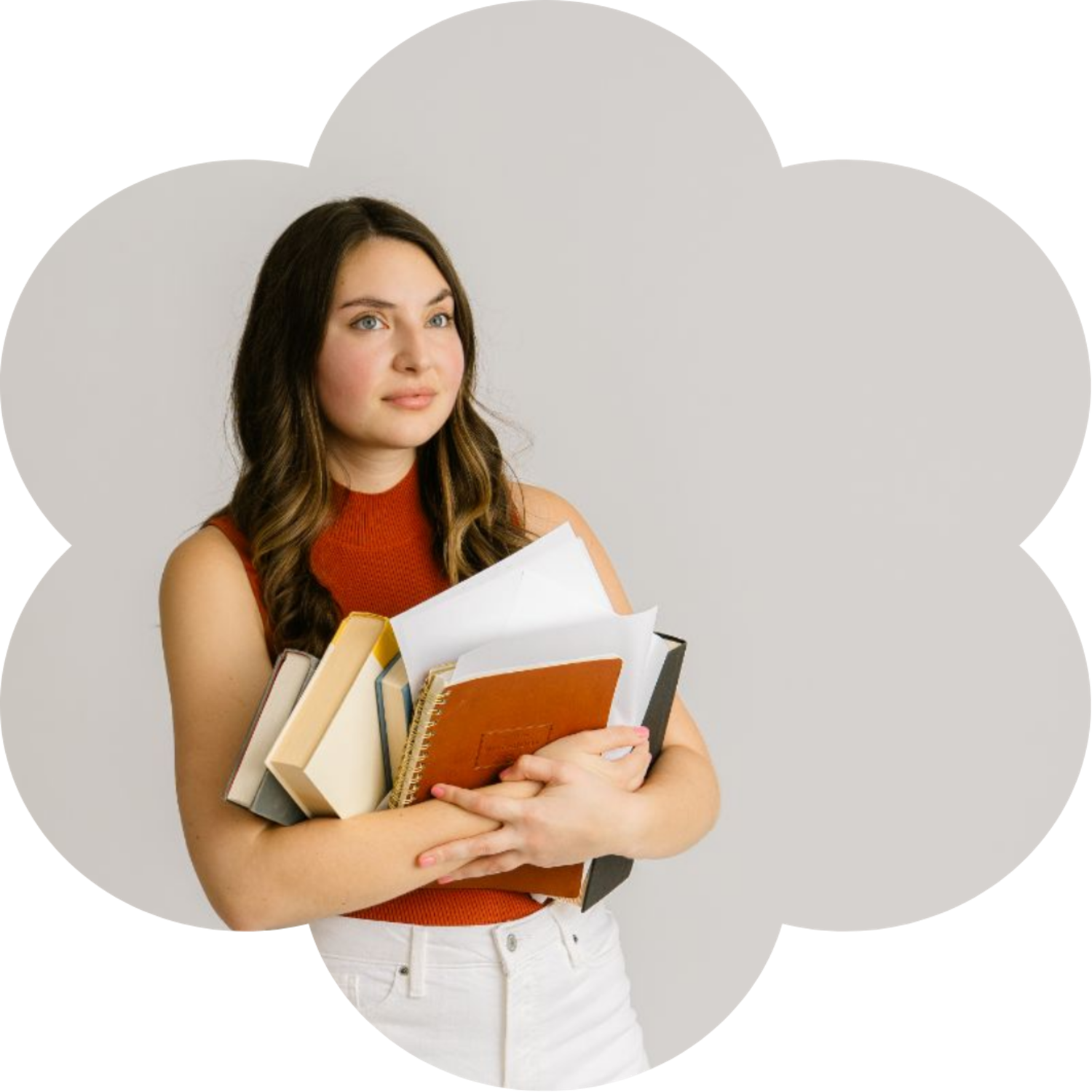 business systems expert client standing looking away from camera holding books