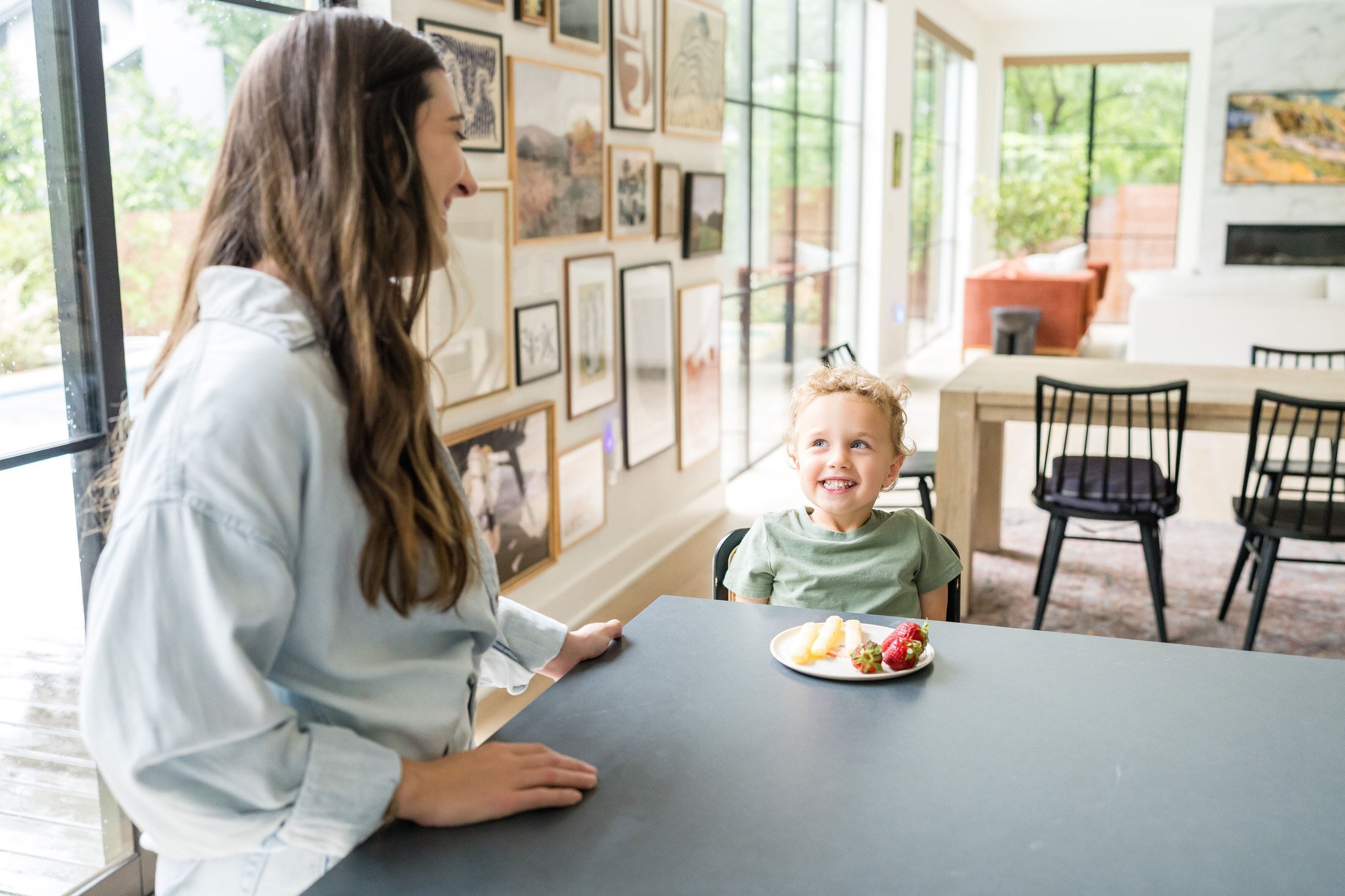 Nanny preparing snack time in the kitchen for Stork Maternity Consulting