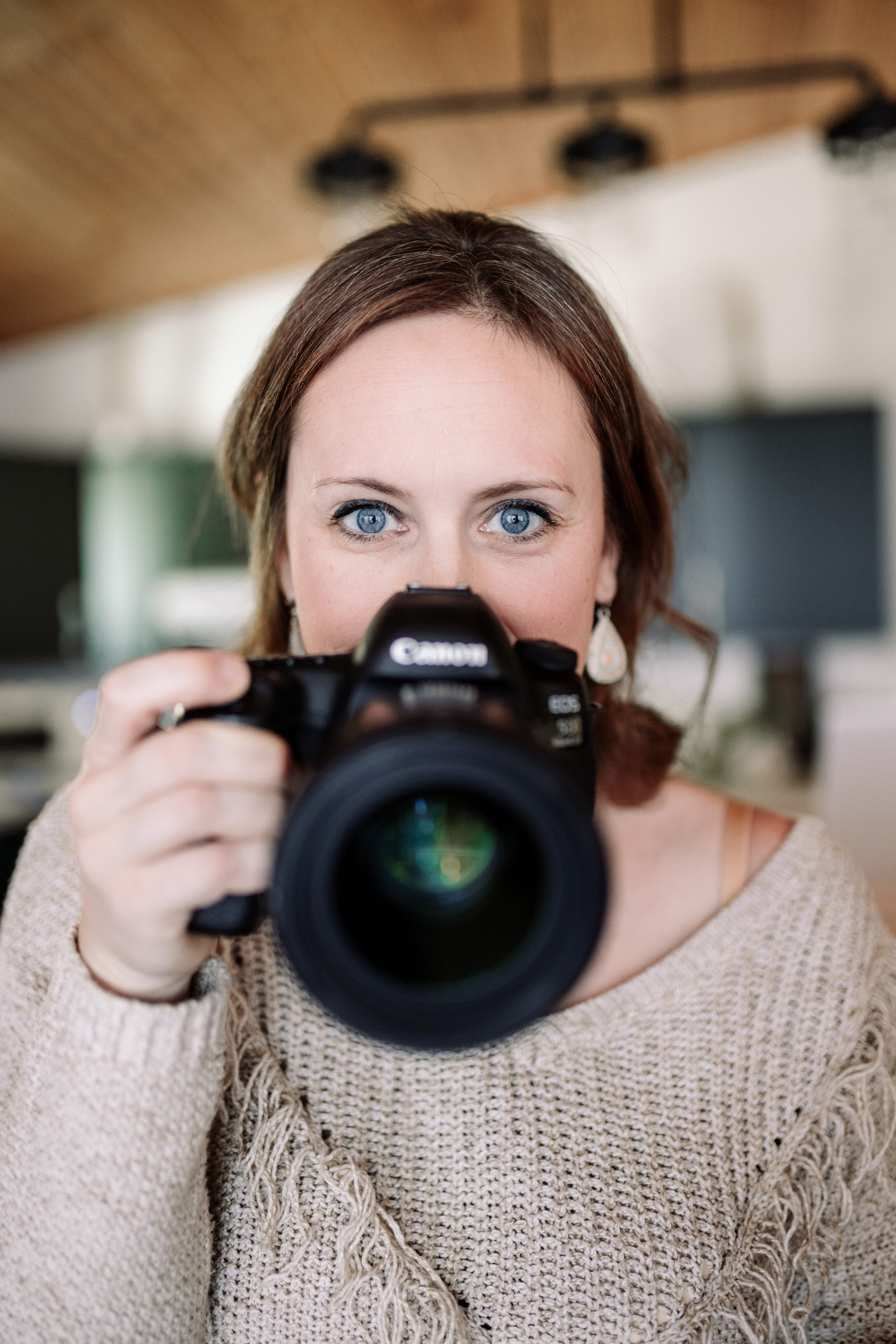 Emily McNiel holding a camera