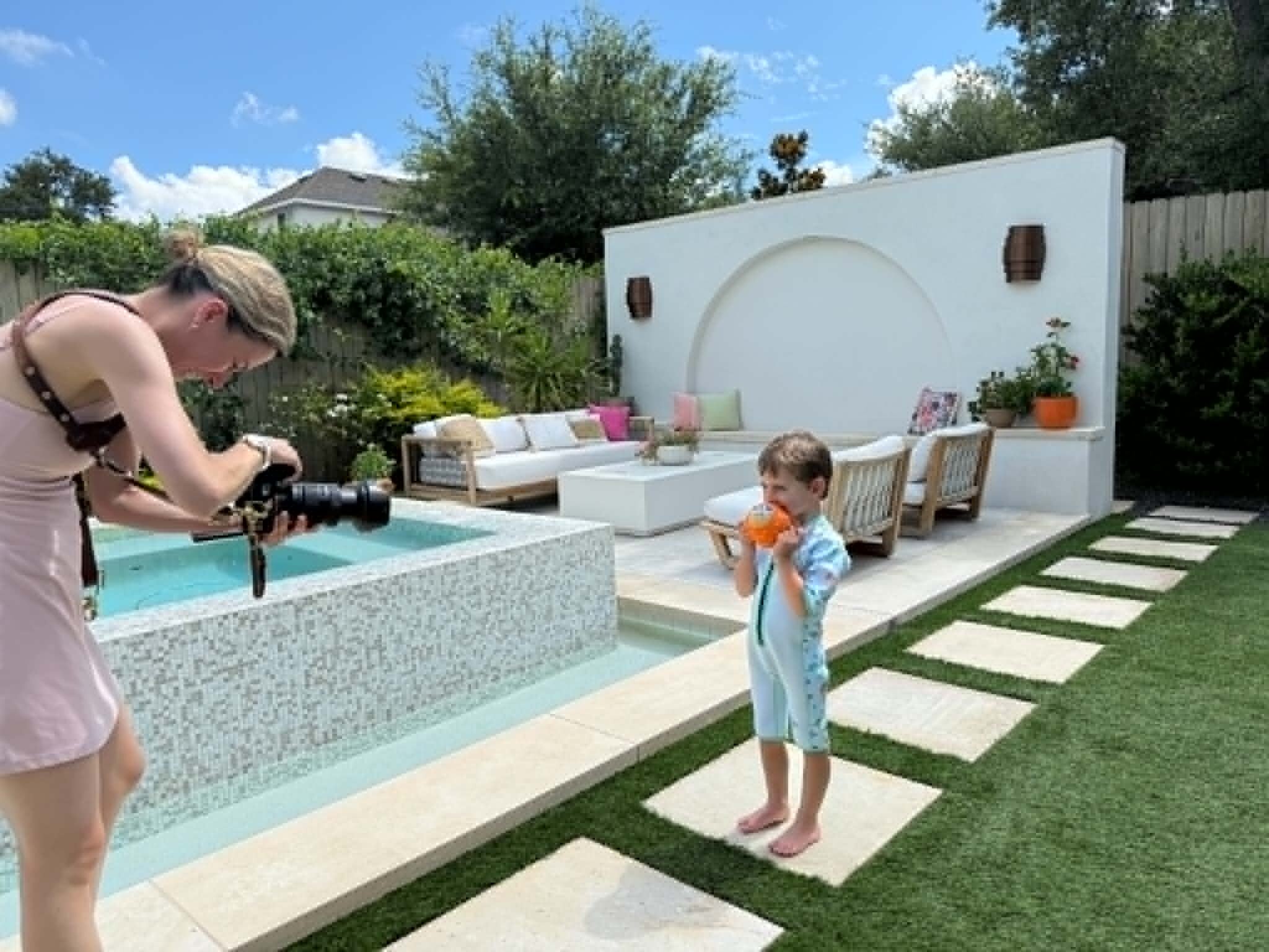 Behind the scenes of a poolside photography session for Splash About in Austin