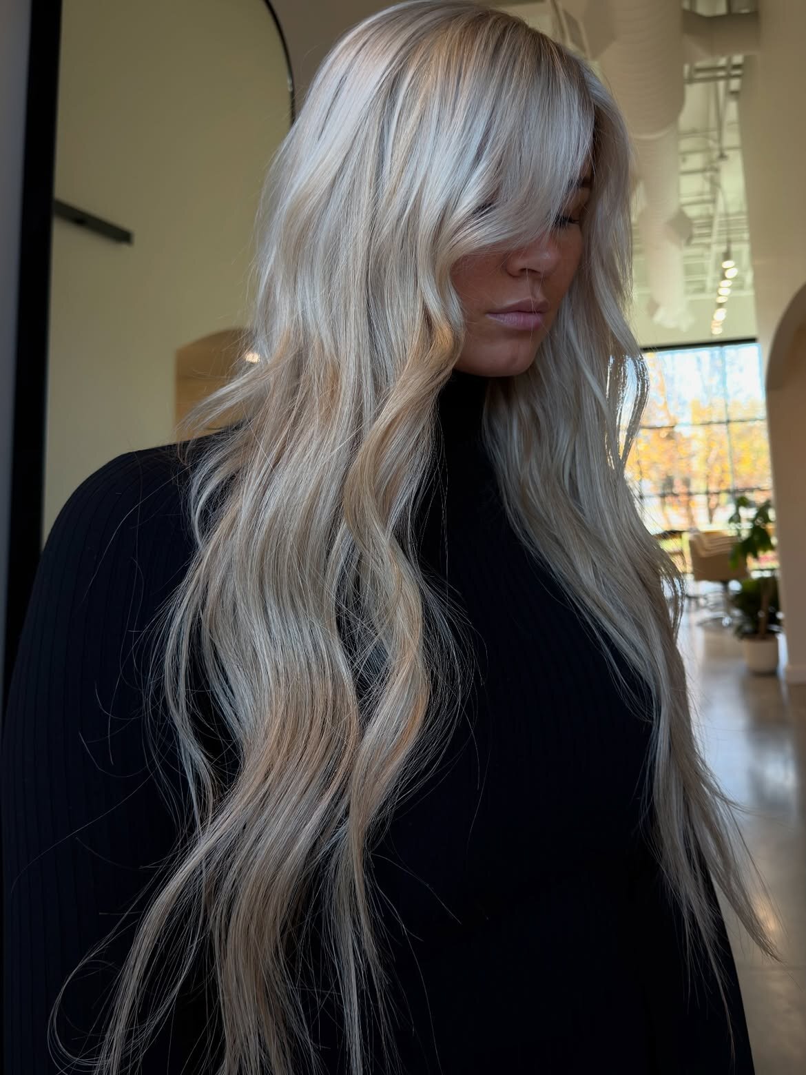 Blonde hair color and hand-tied extensions by Echelon Salon in Eagle, Idaho