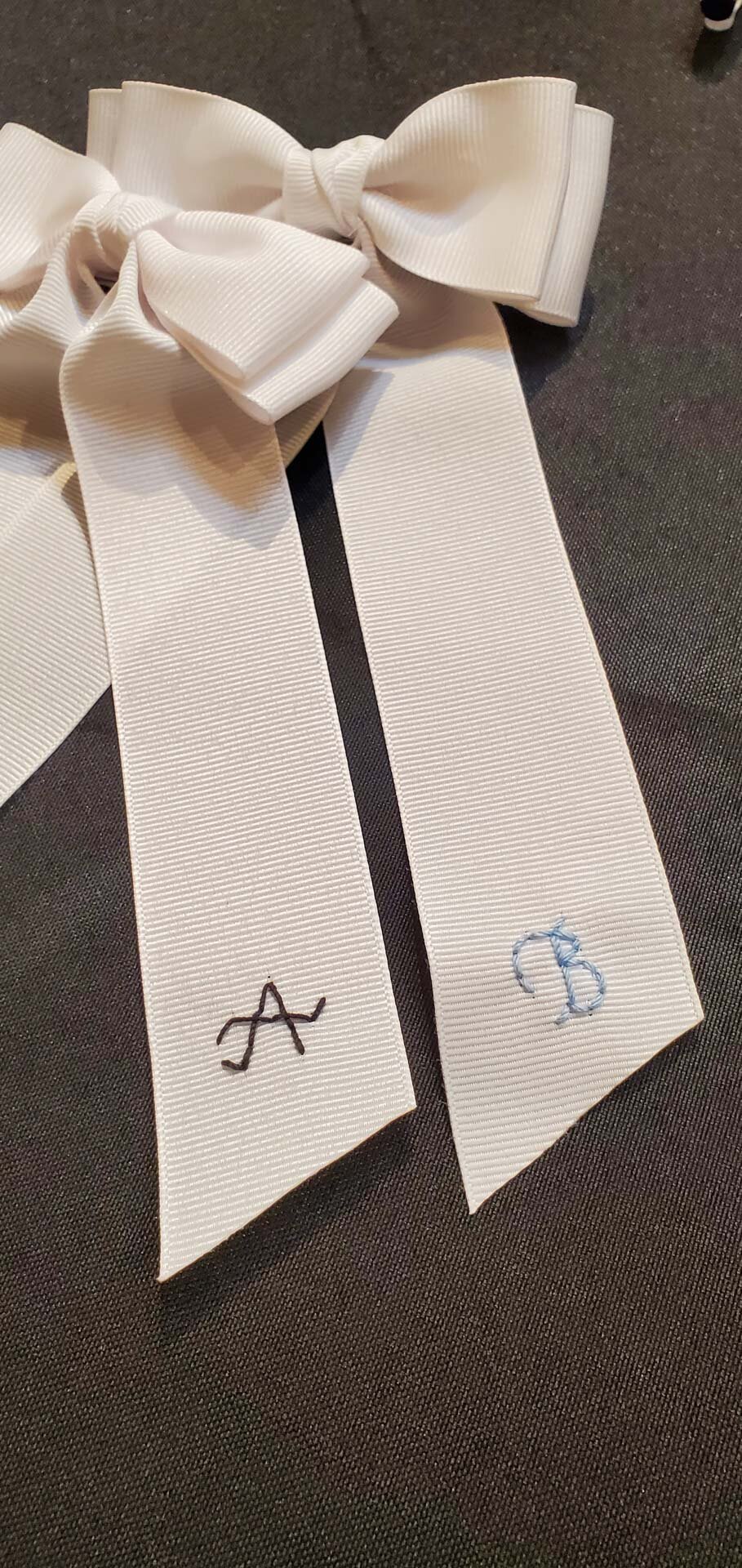 Hand embroidered ribbon calligraphy bridal gifting