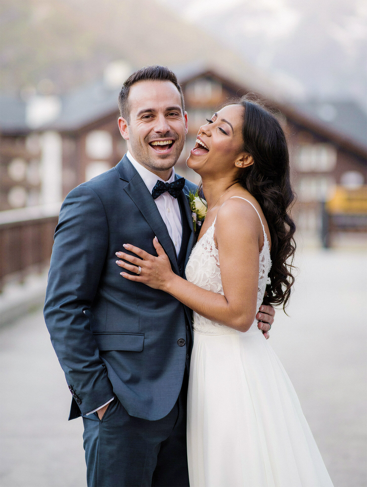 Laughing destination wedding couple at a Chamonix resort in France