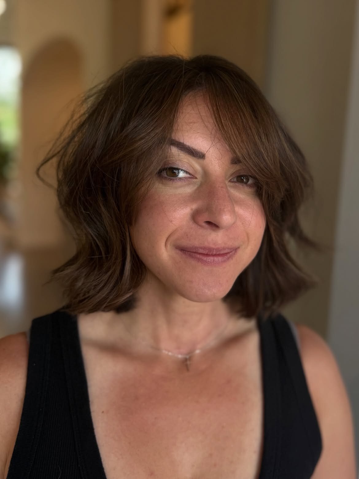Brunette hair color and precision haircut done at our salon in Eagle, Idaho