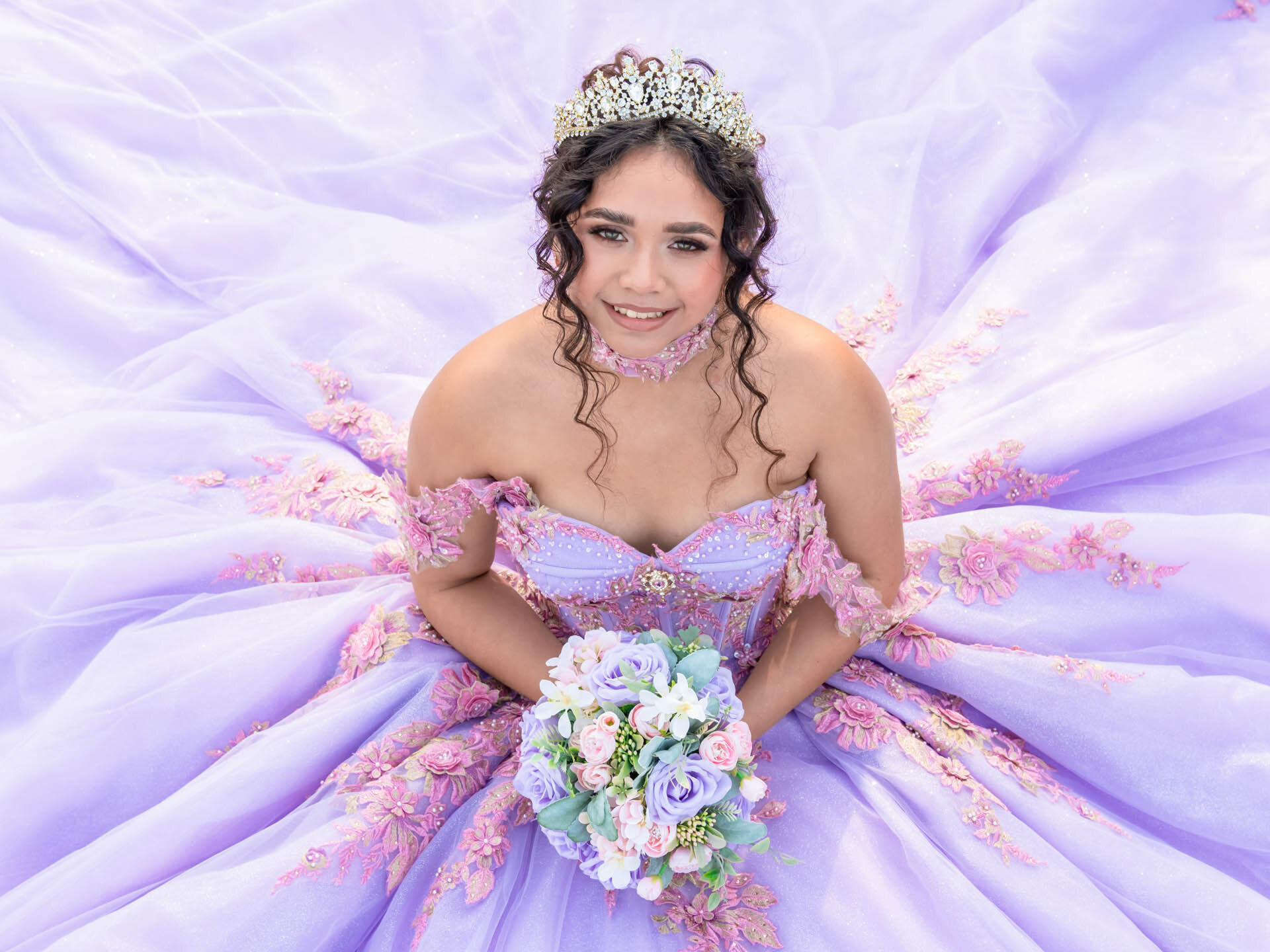Quinceañera editorial portrait in a botanical garden