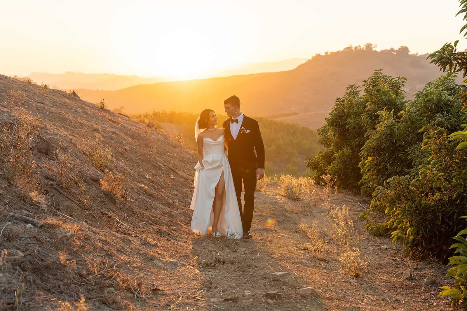 Couple on a hilltop at sunset, wedding in Temecula, California