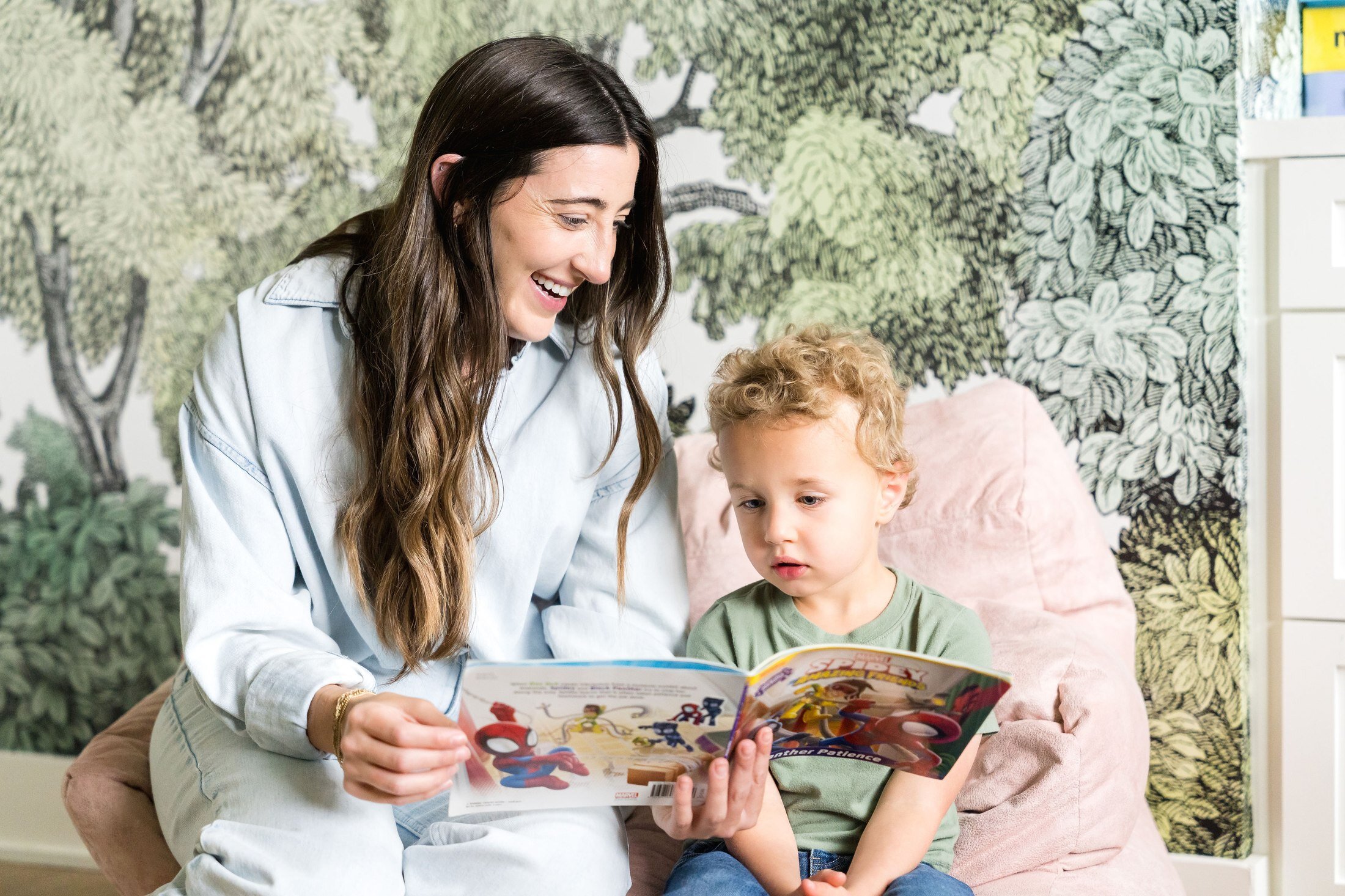 Nanny reading storytime with a child for Stork Maternity Consulting