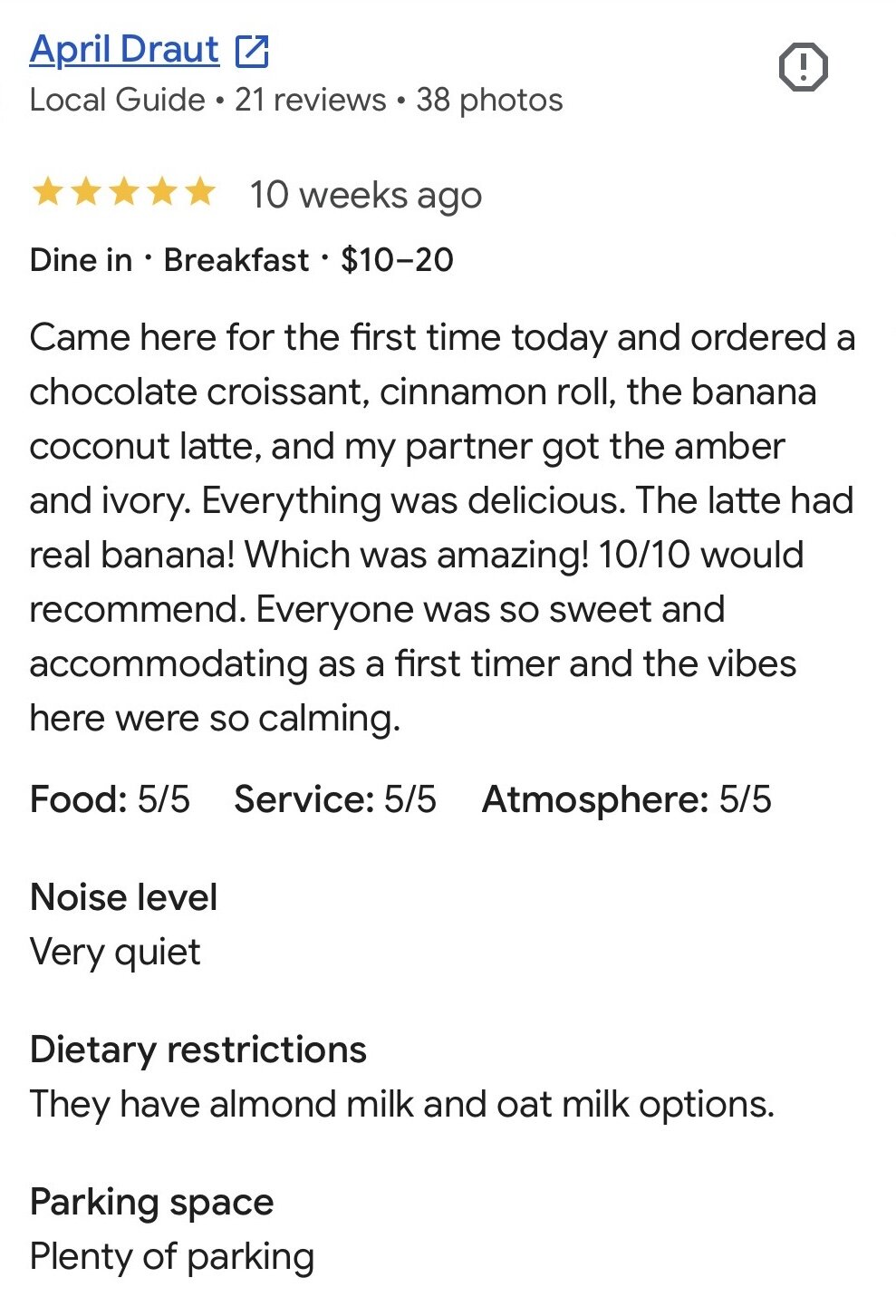 Five-star Google review of VIVRE coffee shop in Wichita praising the banana coconut latte, chocolate croissant and calming atmosphere