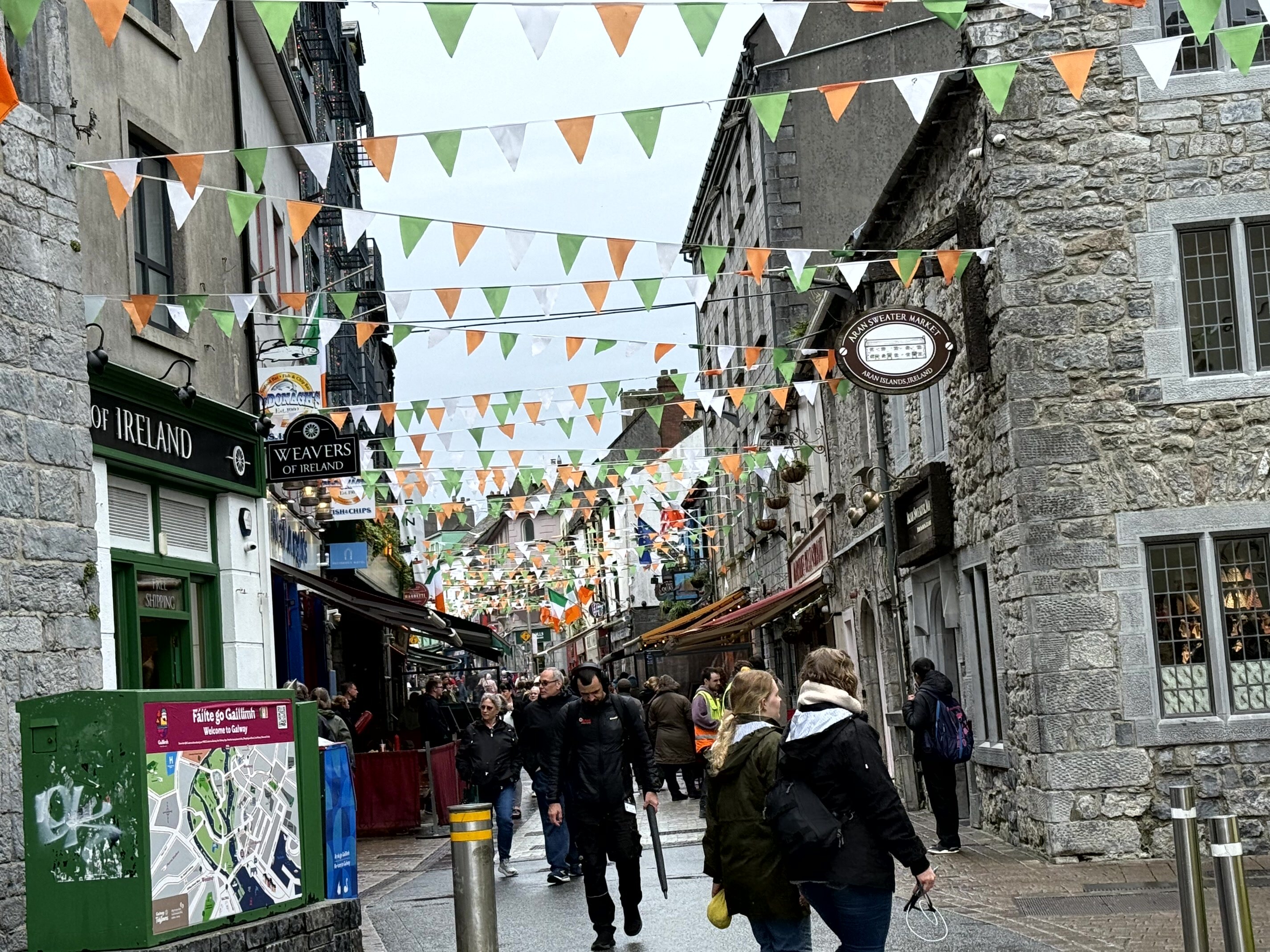 Shop Street with Irish tricolor bunting, Galway