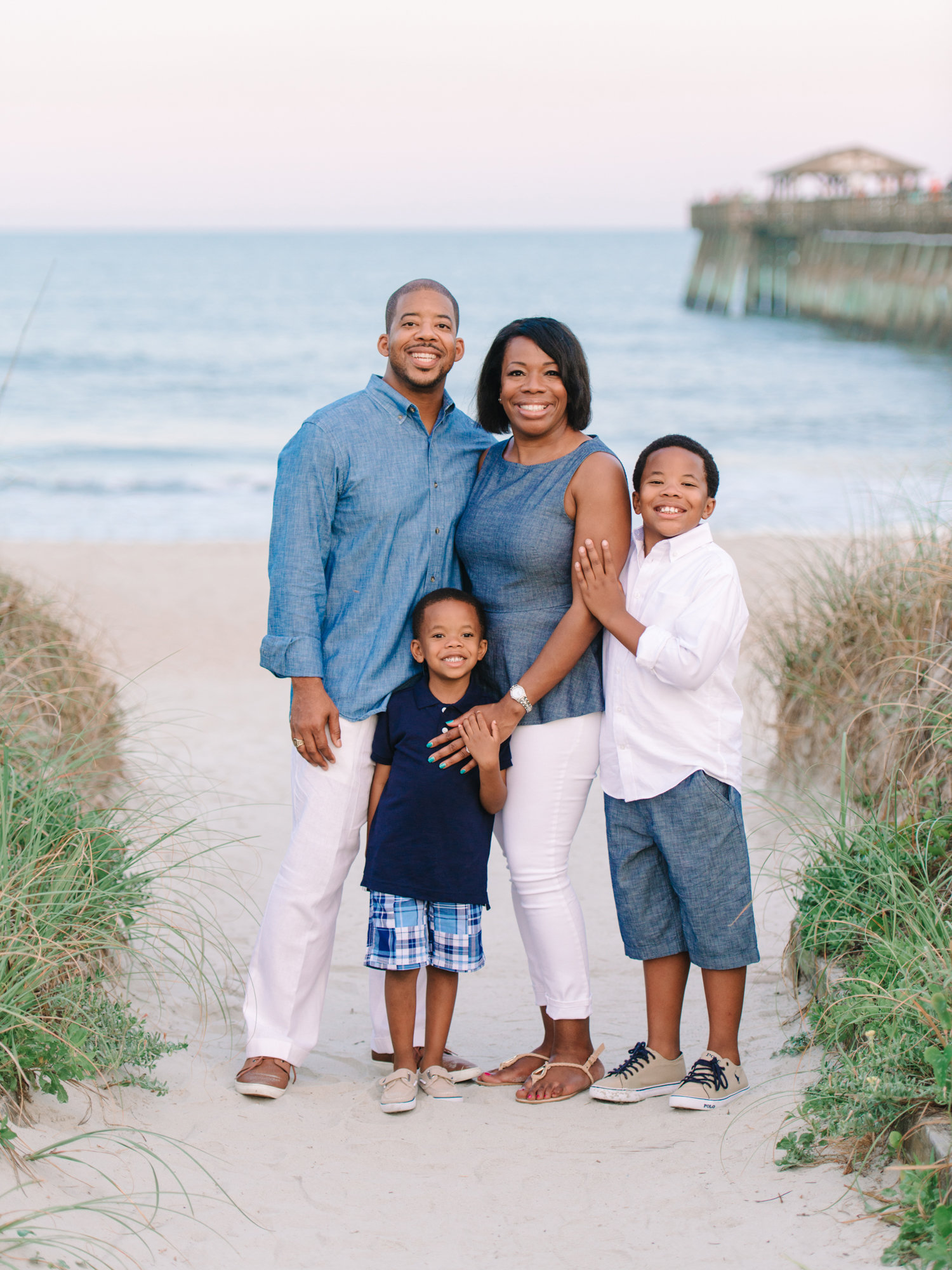 Family beach portraits at Myrtle Beach State Park during golden hour
